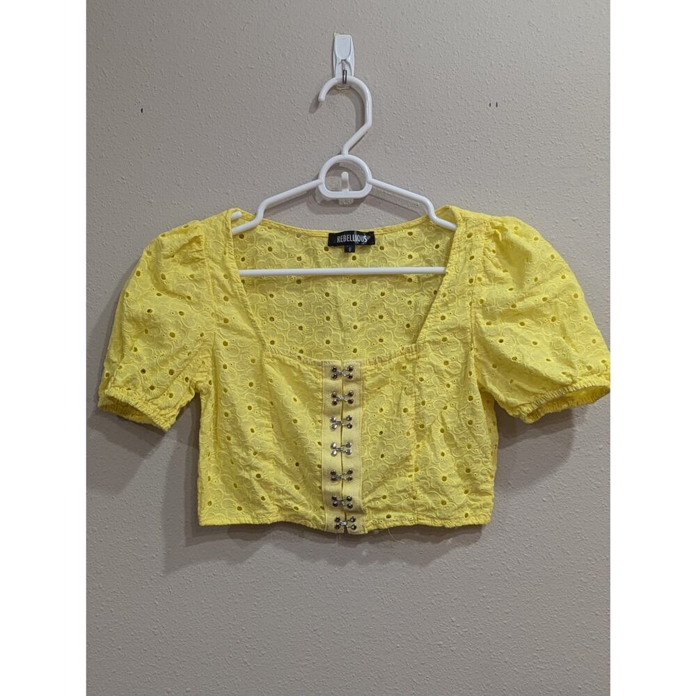 Juniors yellow eyelet peasant style crop top w/hook & eye closure by Rebellious